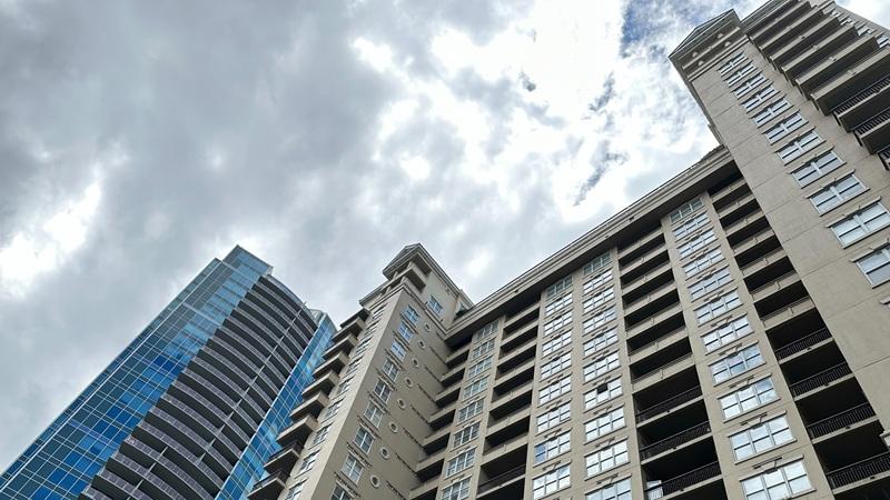 High-rise apartment buildings against overcast sky