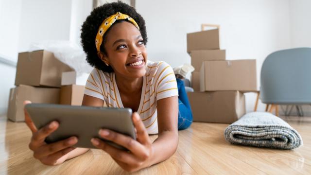 Woman looks around rented apartment