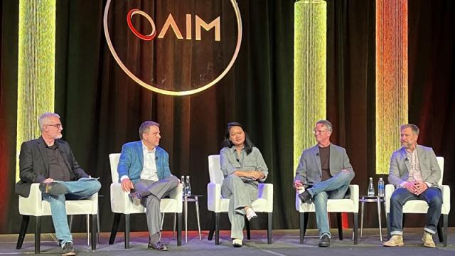 Panel discussion at AIM 2025, led by moderator Brent Steiner
