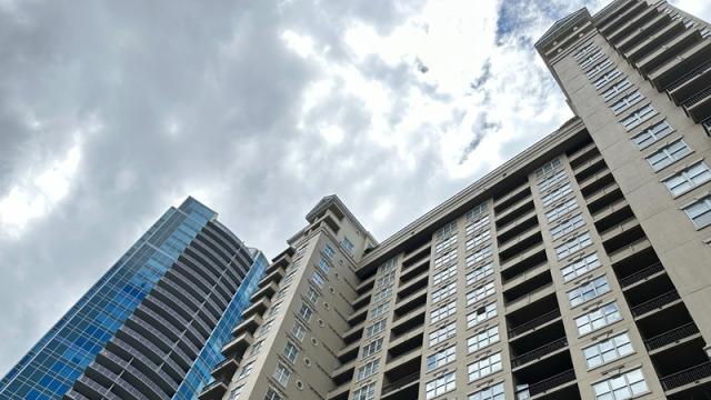 High-rise apartment buildings against overcast sky